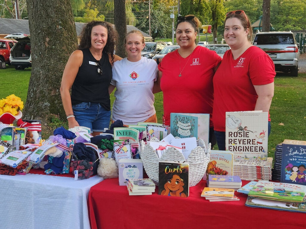 JLLVPA members distributing Bedtime Bundles at The Kindness Project picnic 